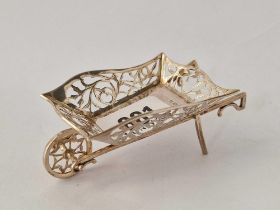 A sweet dish in the form of a wheel barrow with pierced sides, 3.5" long, Birmingham 1908