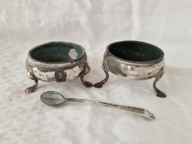 Two Georgian salts on pad feet, London 1795 and circa 1770 and a salt spoon by HB, 95g
