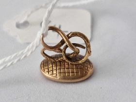 A Gold Snake Topped Seal
