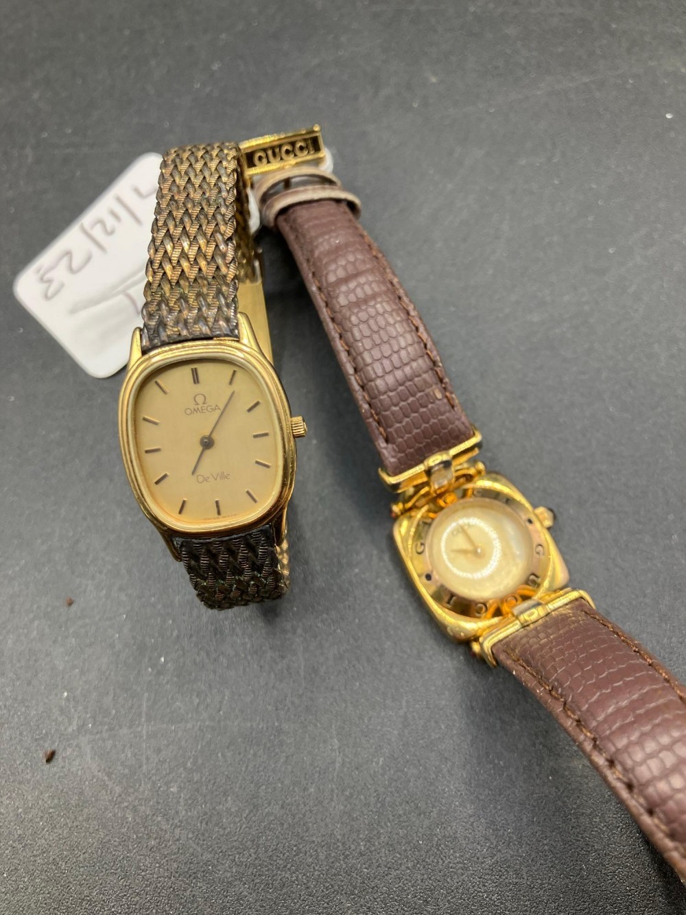 A Ladies Omega Deville And Gucci Wrist Watches