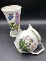 A Portmeirion Milk Jug And Vase