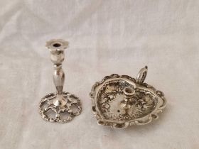 A Miniature Embossed Chamber Candlestick And A Decorative Candlestick (Continental)