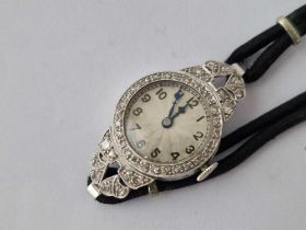 A Platinum And Diamond Edwardian Ladies Watch