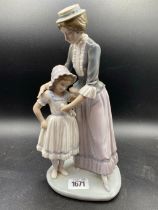 A Lladro Figure Of Mother And Girl