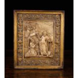 An Early 17th Century Mechelen Alabaster Plaque carved in relief and embellished with gilding.