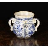 An Early 18th Century Blue & White Delft Posset Pot (lacking cover, with old restorations), 4¾" (