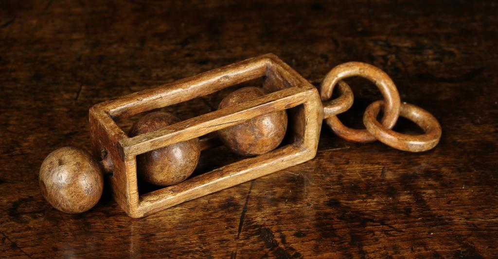 A Welsh Treen 'Lantern Form' Love Token with two balls encases in a square section cage hanging - Image 2 of 2