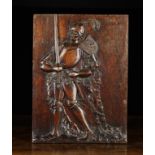 A 17th Century Style Oak Panel carved in relief with full length figure of Floris V; the 13th