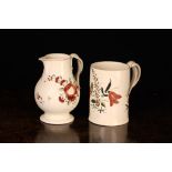 An 18th Century Creamware Jug and Tankard. The jug of baluster form, circa 1770, hand painted in