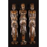 A Set of Three 16th Century French Walnut Terms. The relief carved caryatids in the form of a female