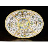 A Late 16th Century Oval Maiolica Platter, Urbino. The piece decorated in yellow, ochre and blue