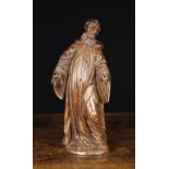 A 16th Century Carved Walnut Sculpture of a Tonsured Monk with long wavy beard wearing a hooded