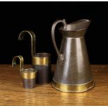 A Brass Bound Tôleware Jug & Two Measuring Cups. The jug with conical body raised on a brass band