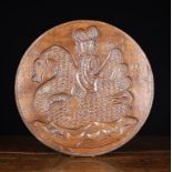 A Large 19th Century Dutch Cheese Mould carved with depiction of William of Orange, riding on the