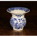 A Rare Worcester Blue & White Spitoon, Circa 1785. The globular body painted in blue with a