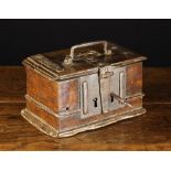 An 18th Century Iron Bound Walnut Safe Box. The hinged lid with swing handle and an iron mount to