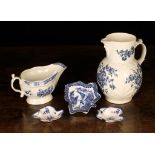 Five Pieces of Blue & White Worcester: A moulded cabbage leaf jug with face mask spout, printed in