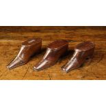 Three 19th Century Treen Snuff Boxes in the form of Lady's shoes. Each intricately decorated with