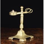 A Rare Brass Wax Jack Circa 1830. The scissor handled taper holder on a ball finialed stem and