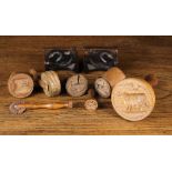 A Group of 19th Century Carved Treen Decorative Butter Stamps, a roller mould, a pastry jigger,