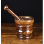 A Fine Charles II Turned Lignum Pestle & Mortar with decorative turned mouldings,