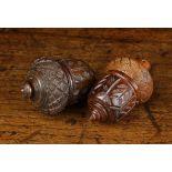 Two Fine Early 19th Century Coquilla Nut Nutmeg Cases complete with graters, carved in the form of