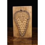 A 19th Century Ginger Bread Mould. The 1½" (4 cm) rectangular wood slab carved with a bunch of