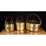 Three Large Antique Lidded Brass Pans and a Brass Sheet Brass Drainer. The largest pan of oval