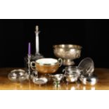 A Group of Vintage Silver Plated Wares: An embossed and chased silver plate on copper punch bowl