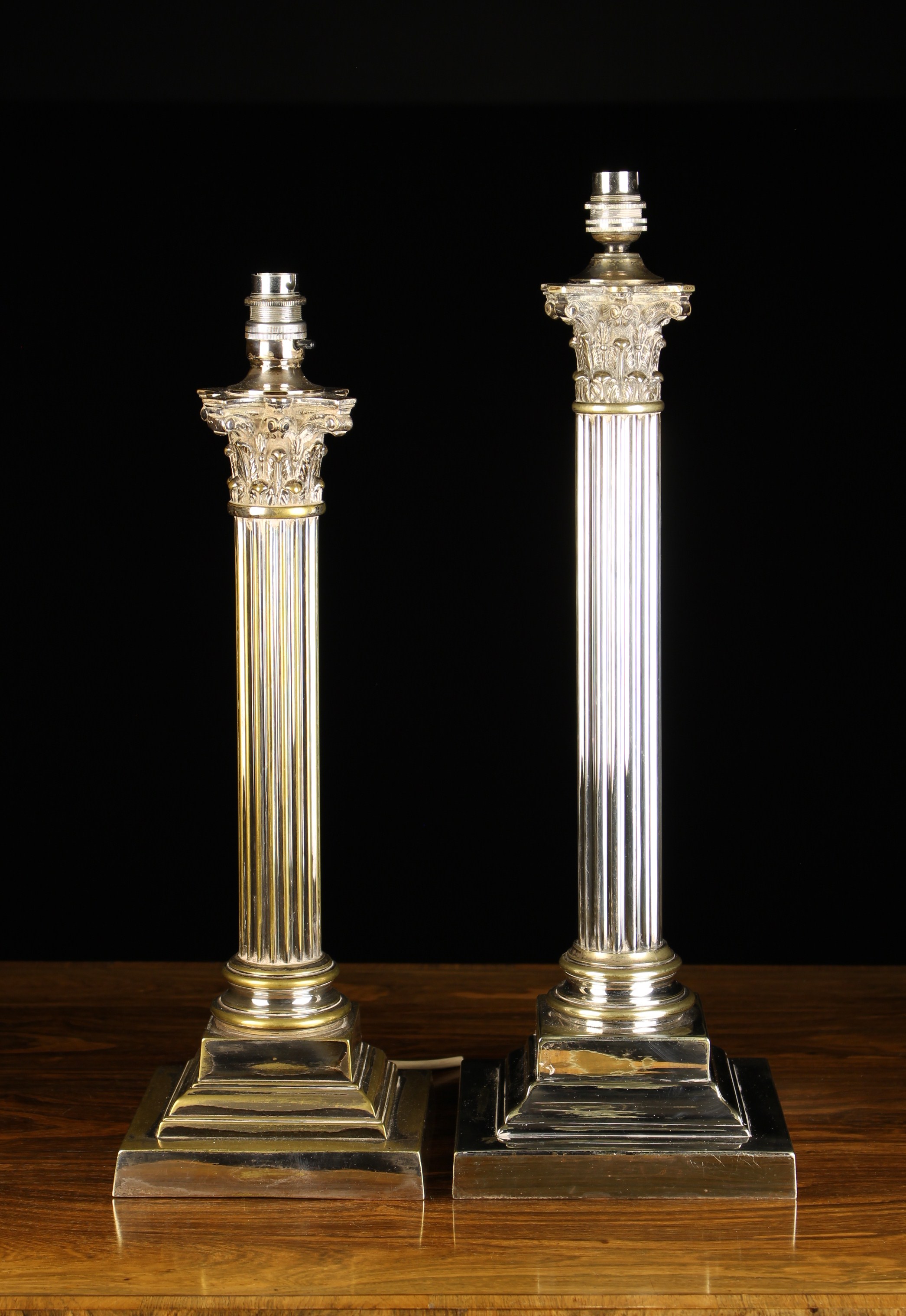 Two Silver Plated Corinthian Column Table Lamps.