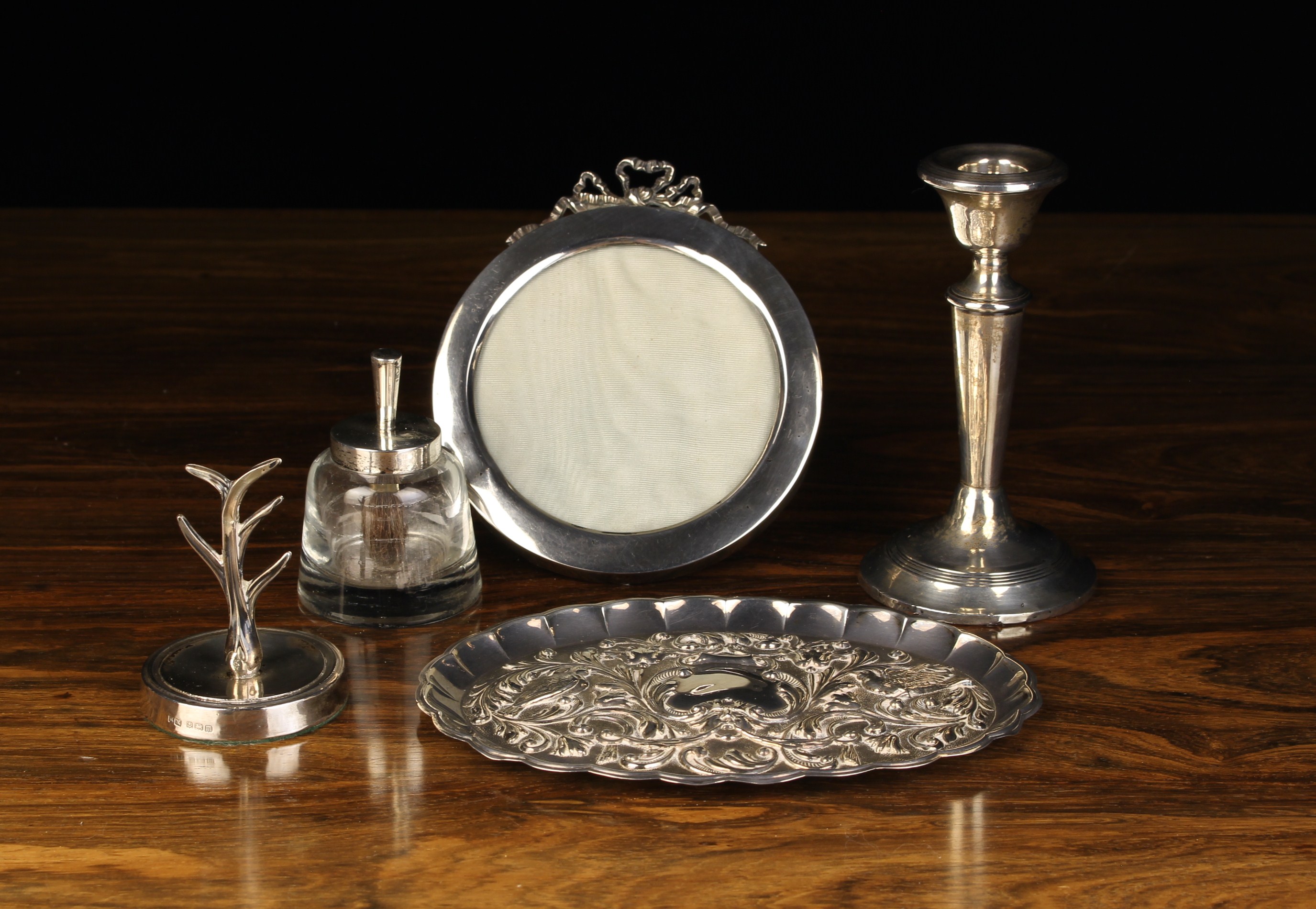 A Group of Silver: A round photograph frame with strut support and a ribbon bow surmount,