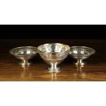 A Pair of Silver Tazze and a Pedestal Bowl.