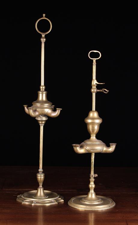 Two 19th Century Brass Lucerne Oil Lamps with height adjustable fonts on central stems surmounted