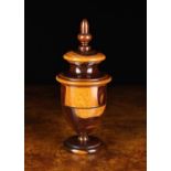 A Fine George III Lignum Vitae Coffee Grinder turned from contrasting coloured timber of striking