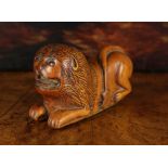 A Fine Late 18th/Early 19th Century French Carved Boxwood Snuff Box in the form of a Recumbent Lion.