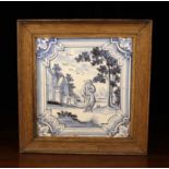 A Large Late 18th Century Blue & White Pictorial Tile painted with a figure, possibly a priest,