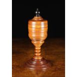A 19th Century Turned Walnut Jar & Cover of Goblet Form.