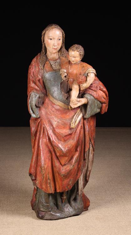 An Early 16th Century Polychromed Oak Carving of Virgin & Child.