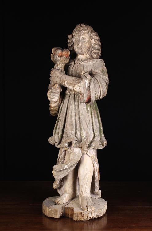 A 17th Century Flemish Wood Carved Figure with traces of residual paintwork (A/F).