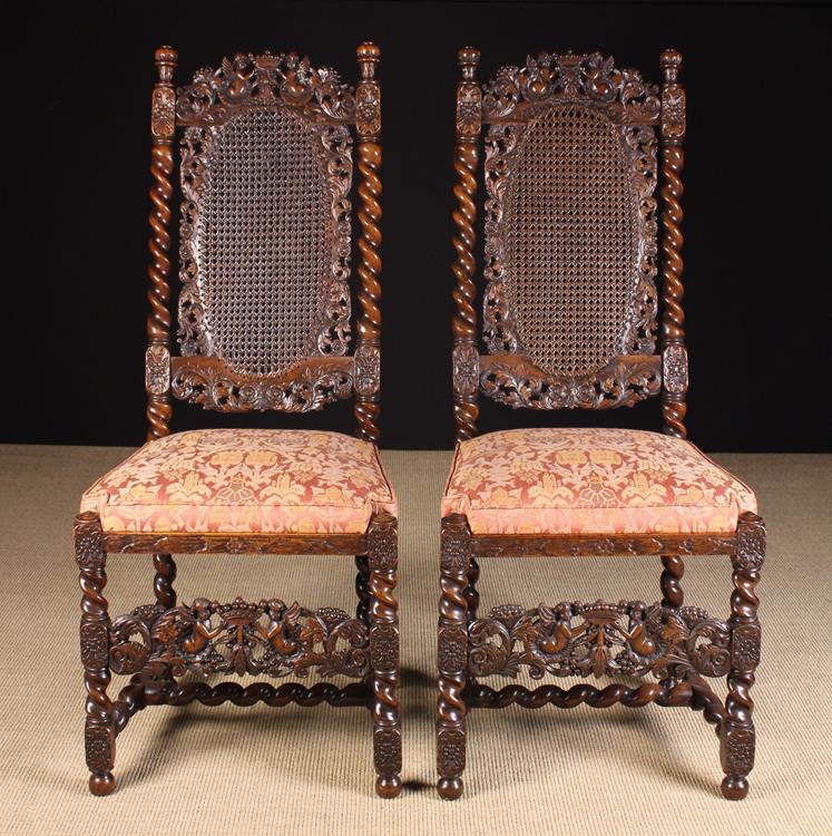 A Pair of Exceptional William & Mary Carved Walnut Side Chairs.