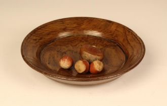 A Rare Early 17th Century Elm Platter with sloping rim and a fine patination, approx 7¼" (18.