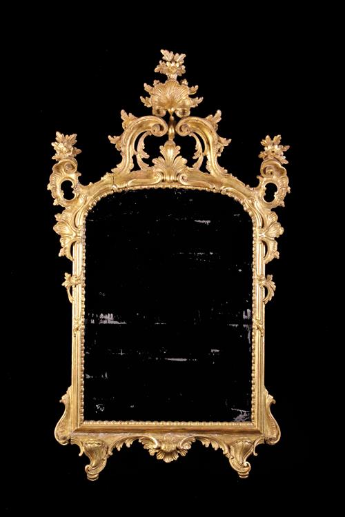 An 18th Century Giltwood Wall Mirror.