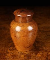 A 18th Century Fruitwood Tea Caddy turned in the form of an oriental ginger jar.
