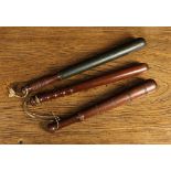 Three Vintage Turned Wooden Police Truncheons: The largest having a green painted body on a ring