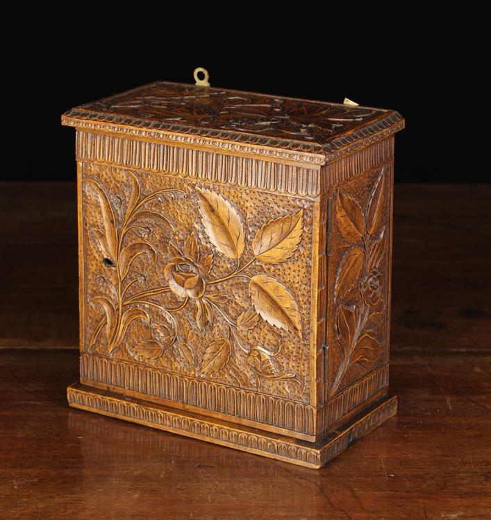 A Delightful Late 19th/Early 20th century Anglo Indian Table cabinet carving with sprays of rose to