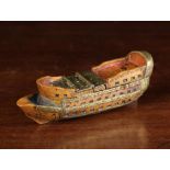 A 19th Century Prisoner of War Snuff Box in the form of a Ship with brass wriggle work mounts