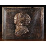 A Carved Tudor Oak Fragment Relief of a Lady's Head carved in profile,