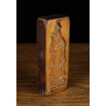 A Fruitwood Gingerbead Mould carved with a Bishop; probably Saint Nicholas to a rectangular block,
