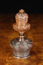A Fine Quality Early 19th Century Carved Coquilla Nut Combined Spice Box & Nutmeg Grinder in four