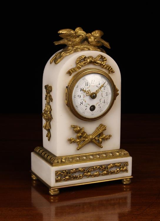 A Small Louis XVI Style White Marble & Gilt Bronze Marble Clock.